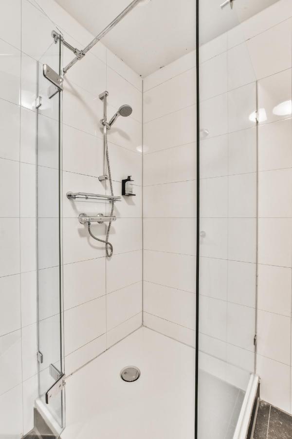 Appartement Met Frontaal Zeezicht In Блумендал Екстериор снимка