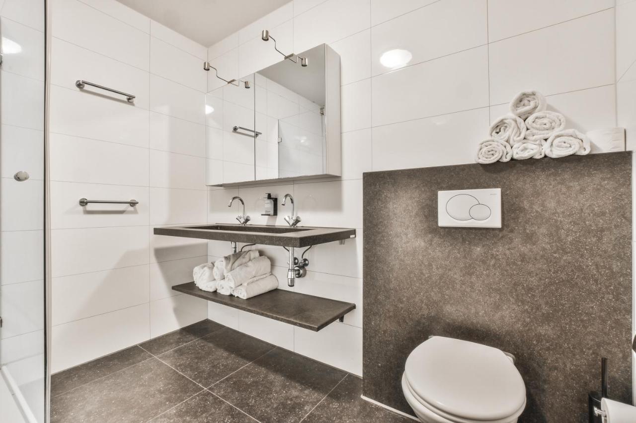 Appartement Met Frontaal Zeezicht In Блумендал Екстериор снимка