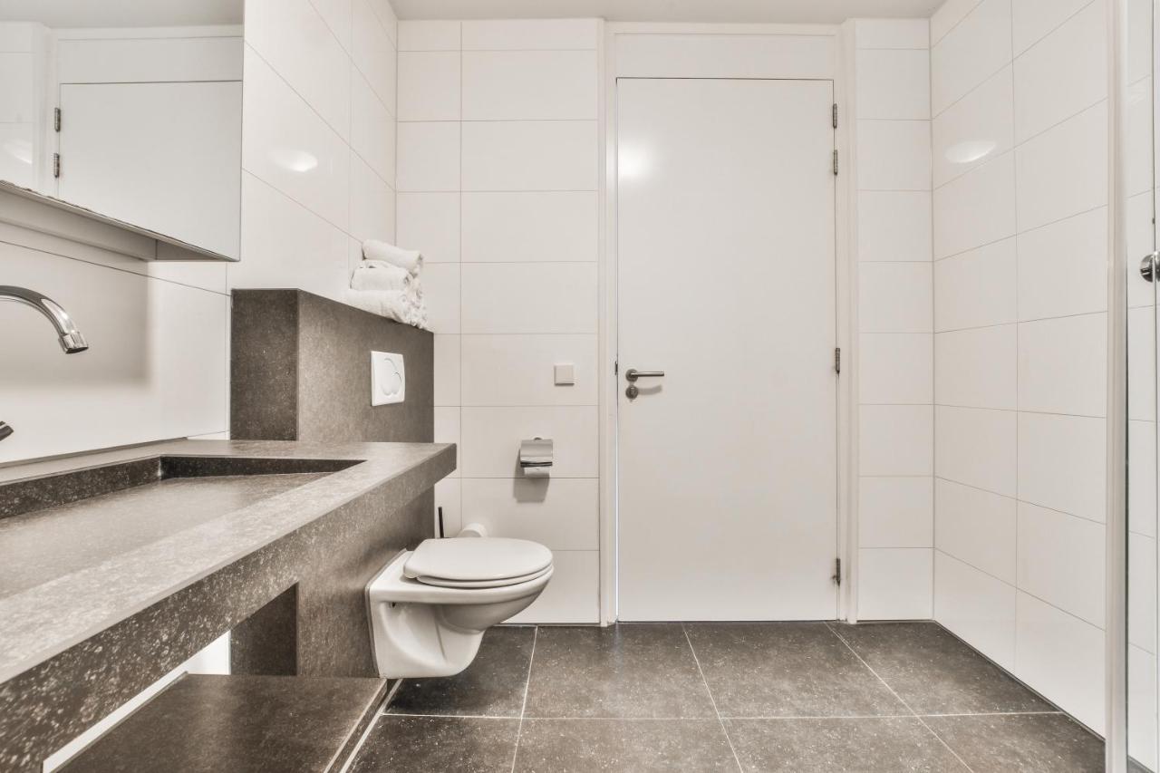 Appartement Met Frontaal Zeezicht In Блумендал Екстериор снимка
