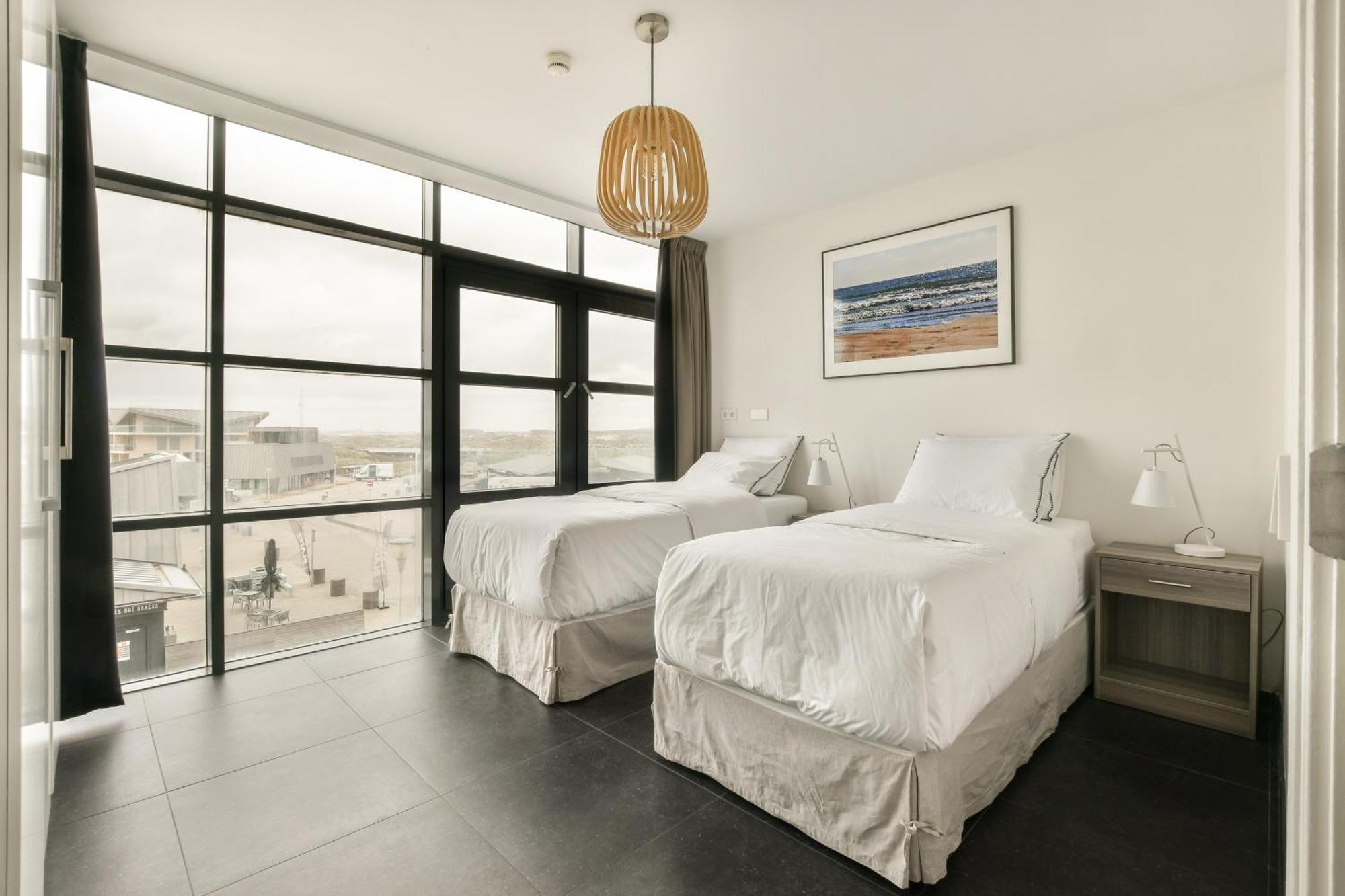 Appartement Met Frontaal Zeezicht In Блумендал Екстериор снимка